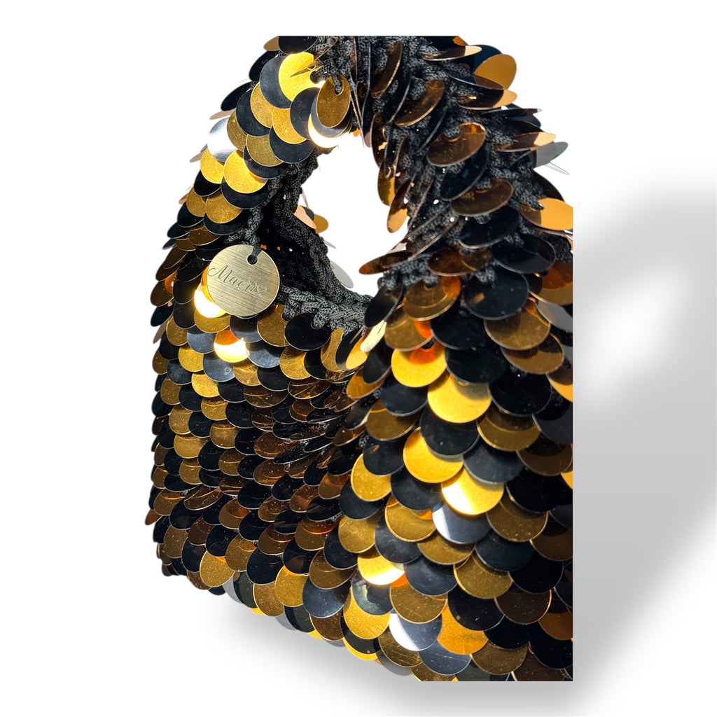 Ariel Oro Nero Maison Macrì